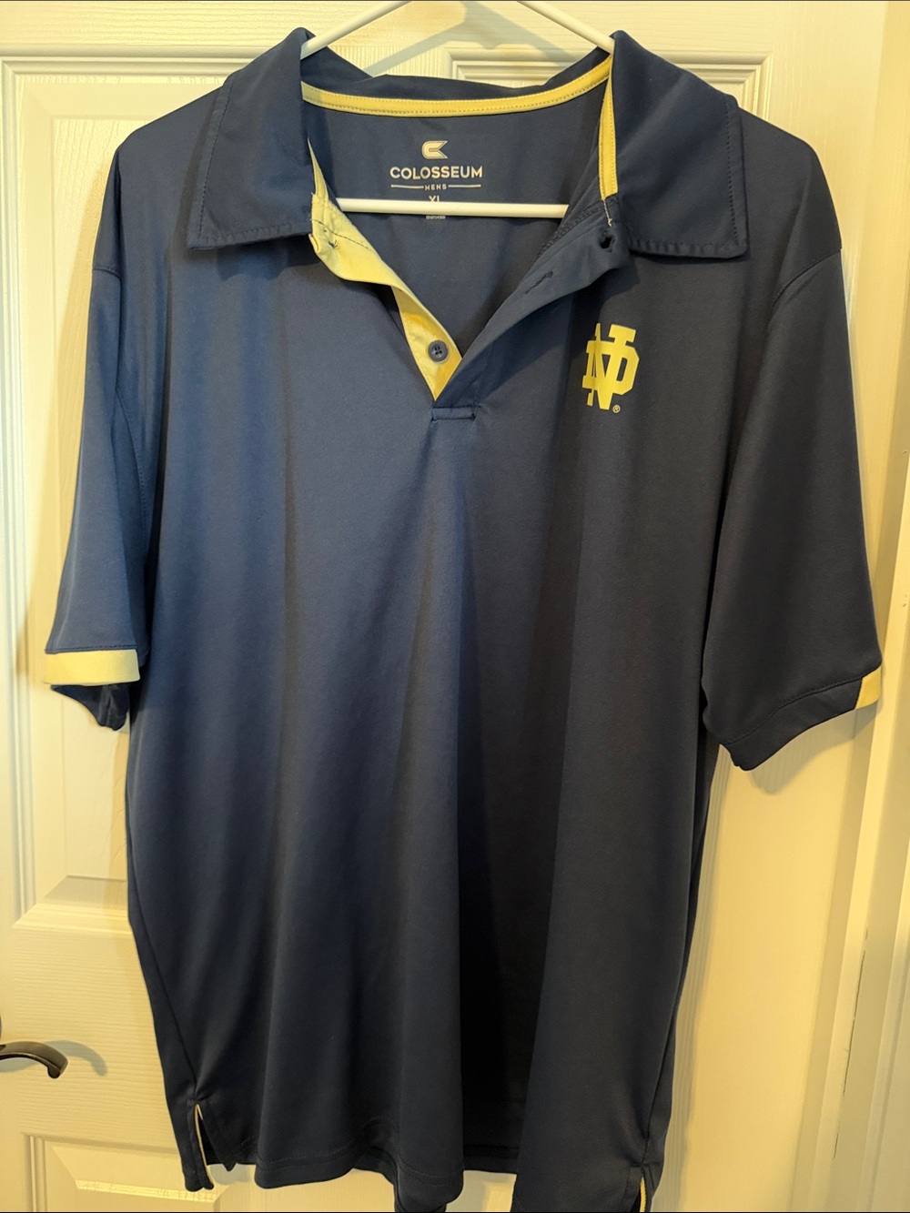 Colosseum Navy Polo with Gold Trim and Notre Dame Logo